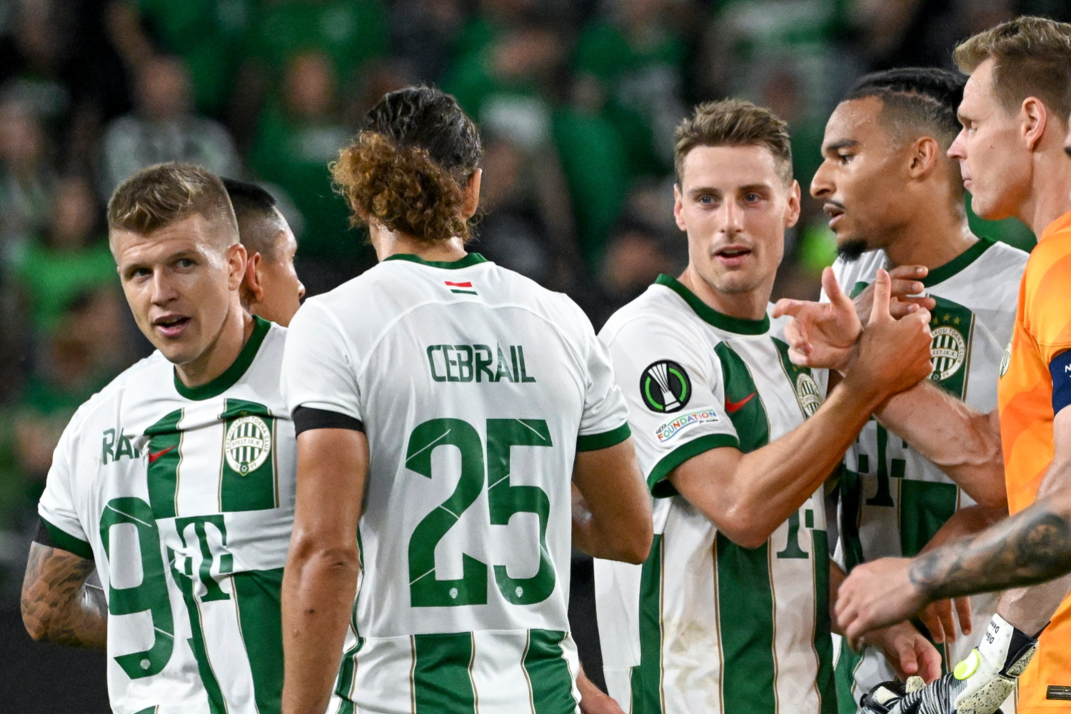 Krisztian Lisztes of Ferencvarosi TC celebrates with teammates after